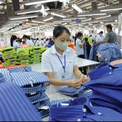 Quality control inspection of finished garments before packing